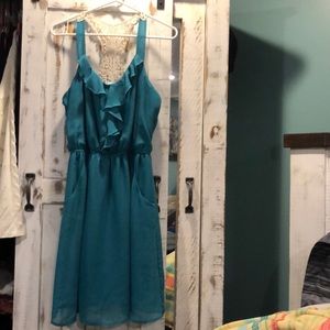 Turquoise dress.